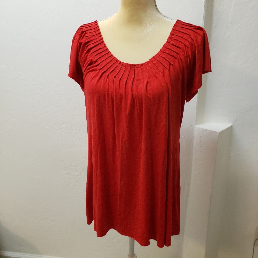 Evie. Red short sleeve top with pleated neck area